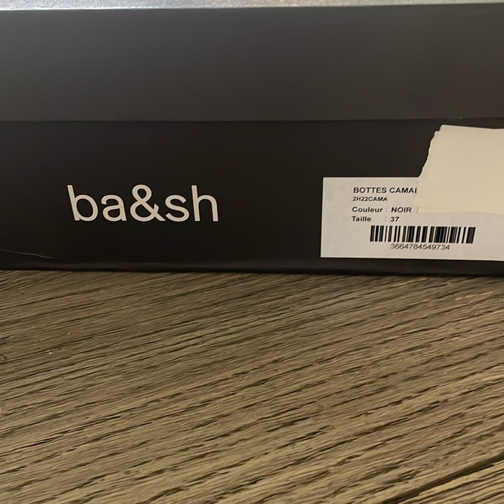 Knee high leather boots. Brand new. Never worn.